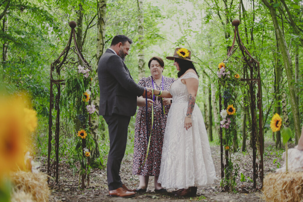Shelley Bell Celebrant 'ties the knot' in a handfasting ceremony at Mannings Farm where the couple make their own personalised vows and promises for the years ahead.