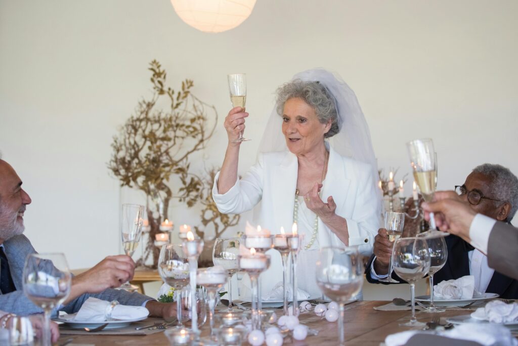 The bride gives a fabulous speech at her wedding breakfast and raises a toast to those present.