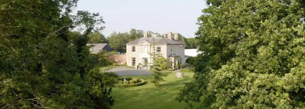 The sunshines on a beautiful country house set amongst beautiful gardens in Essex