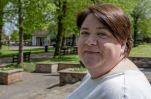 Shelley Bell smiles as she looks over her shoulder